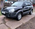 Черный Хендай Туксон, объемом двигателя 2 л и пробегом 272 тыс. км за 7500 $, фото 1 на Automoto.ua