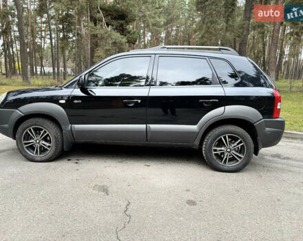 Черный Хендай Туксон, объемом двигателя 1.99 л и пробегом 266 тыс. км за 7500 $, фото 14 на Automoto.ua