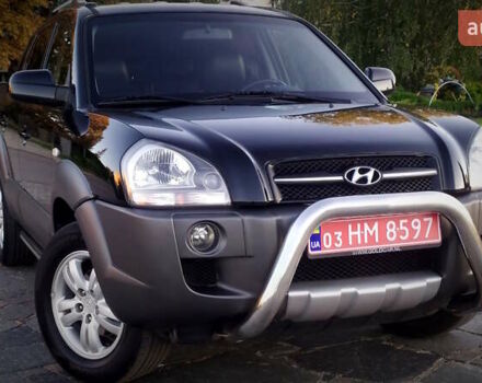 Черный Хендай Туксон, объемом двигателя 2 л и пробегом 230 тыс. км за 8600 $, фото 92 на Automoto.ua