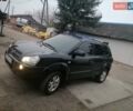 Черный Хендай Туксон, объемом двигателя 1.98 л и пробегом 238 тыс. км за 8400 $, фото 3 на Automoto.ua