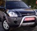 Черный Хендай Туксон, объемом двигателя 2 л и пробегом 230 тыс. км за 8600 $, фото 92 на Automoto.ua