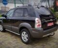 Чорний Хендай Туксон, об'ємом двигуна 2 л та пробігом 229 тис. км за 8600 $, фото 48 на Automoto.ua