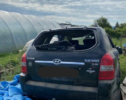 Черный Хендай Туксон, объемом двигателя 2 л и пробегом 250 тыс. км за 3500 $, фото 2 на Automoto.ua