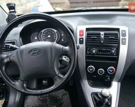 Чорний Хендай Туксон, об'ємом двигуна 2 л та пробігом 207 тис. км за 8200 $, фото 31 на Automoto.ua