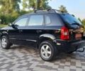 Черный Хендай Туксон, объемом двигателя 2 л и пробегом 190 тыс. км за 8150 $, фото 1 на Automoto.ua