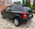 Черный Хендай Туксон, объемом двигателя 2 л и пробегом 219 тыс. км за 8600 $, фото 3 на Automoto.ua