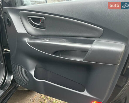 Черный Хендай Туксон, объемом двигателя 2 л и пробегом 180 тыс. км за 7700 $, фото 32 на Automoto.ua