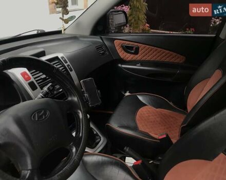 Черный Хендай Туксон, объемом двигателя 2 л и пробегом 210 тыс. км за 8999 $, фото 53 на Automoto.ua
