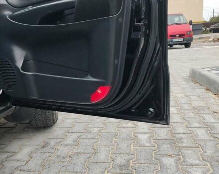 Черный Хендай Туксон, объемом двигателя 2.7 л и пробегом 280 тыс. км за 7200 $, фото 5 на Automoto.ua