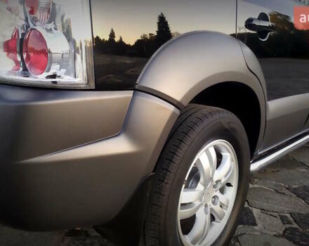 Черный Хендай Туксон, объемом двигателя 2 л и пробегом 230 тыс. км за 8600 $, фото 65 на Automoto.ua