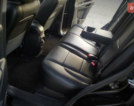 Черный Хендай Туксон, объемом двигателя 2 л и пробегом 230 тыс. км за 8600 $, фото 191 на Automoto.ua