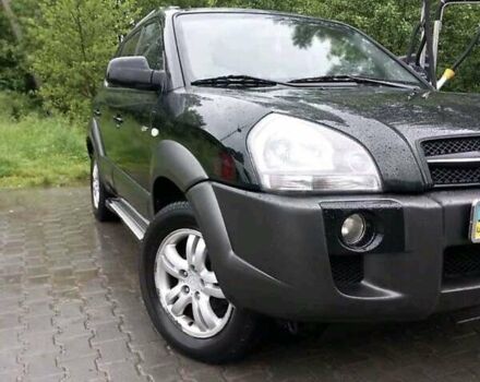 Черный Хендай Туксон, объемом двигателя 1.98 л и пробегом 193 тыс. км за 8000 $, фото 1 на Automoto.ua