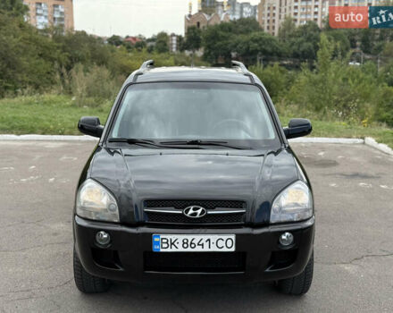 Черный Хендай Туксон, объемом двигателя 2 л и пробегом 300 тыс. км за 7350 $, фото 31 на Automoto.ua
