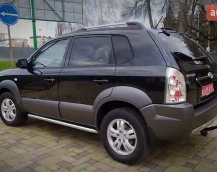 Чорний Хендай Туксон, об'ємом двигуна 2 л та пробігом 229 тис. км за 8600 $, фото 49 на Automoto.ua