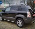 Чорний Хендай Туксон, об'ємом двигуна 2 л та пробігом 229 тис. км за 8600 $, фото 49 на Automoto.ua