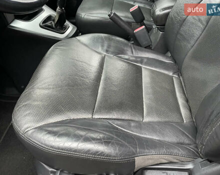 Черный Хендай Туксон, объемом двигателя 2 л и пробегом 180 тыс. км за 7700 $, фото 22 на Automoto.ua