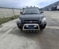 Черный Хендай Туксон, объемом двигателя 2 л и пробегом 233 тыс. км за 10500 $, фото 1 на Automoto.ua