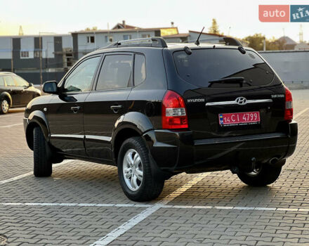 Чорний Хендай Туксон, об'ємом двигуна 2 л та пробігом 197 тис. км за 8150 $, фото 12 на Automoto.ua
