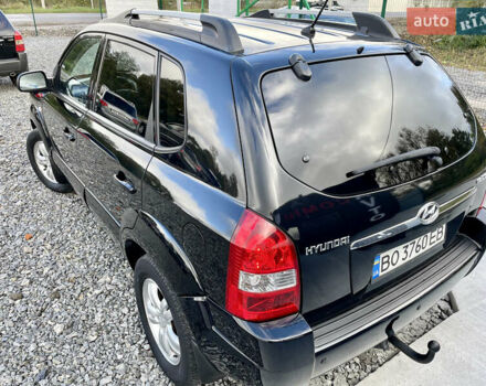 Черный Хендай Туксон, объемом двигателя 2 л и пробегом 224 тыс. км за 7750 $, фото 6 на Automoto.ua