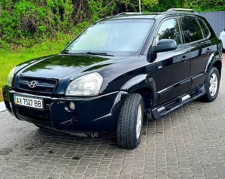 Черный Хендай Туксон, объемом двигателя 2 л и пробегом 175 тыс. км за 8900 $, фото 9 на Automoto.ua