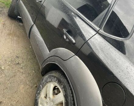 Чорний Хендай Туксон, об'ємом двигуна 2 л та пробігом 230 тис. км за 5999 $, фото 3 на Automoto.ua