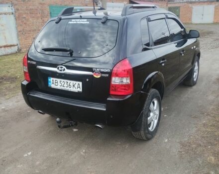 Чорний Хендай Туксон, об'ємом двигуна 2 л та пробігом 246 тис. км за 8100 $, фото 3 на Automoto.ua