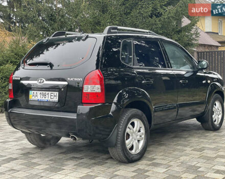 Черный Хендай Туксон, объемом двигателя 2 л и пробегом 180 тыс. км за 7700 $, фото 12 на Automoto.ua