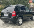 Черный Хендай Туксон, объемом двигателя 2 л и пробегом 180 тыс. км за 7700 $, фото 12 на Automoto.ua