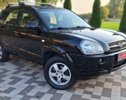 Черный Хендай Туксон, объемом двигателя 2 л и пробегом 190 тыс. км за 8150 $, фото 20 на Automoto.ua