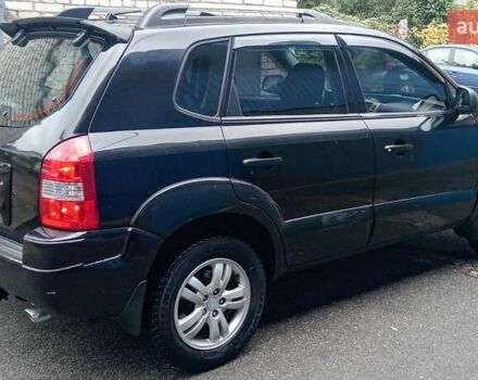 Чорний Хендай Туксон, об'ємом двигуна 2 л та пробігом 308 тис. км за 7555 $, фото 3 на Automoto.ua