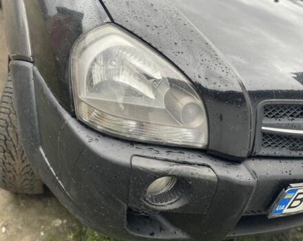 Чорний Хендай Туксон, об'ємом двигуна 2 л та пробігом 230 тис. км за 5999 $, фото 2 на Automoto.ua