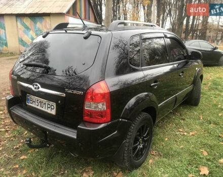 Черный Хендай Туксон, объемом двигателя 2 л и пробегом 210 тыс. км за 8999 $, фото 21 на Automoto.ua
