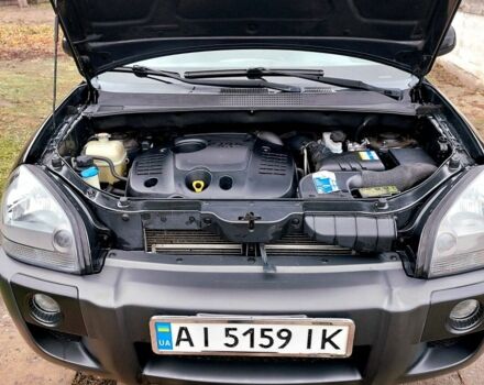 Черный Хендай Туксон, объемом двигателя 2 л и пробегом 272 тыс. км за 7500 $, фото 17 на Automoto.ua