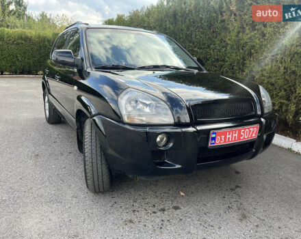 Черный Хендай Туксон, объемом двигателя 2 л и пробегом 256 тыс. км за 7800 $, фото 12 на Automoto.ua