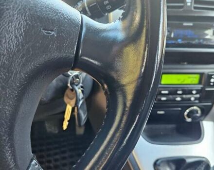 Чорний Хендай Туксон, об'ємом двигуна 2 л та пробігом 152 тис. км за 7950 $, фото 15 на Automoto.ua