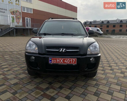 Черный Хендай Туксон, объемом двигателя 2 л и пробегом 209 тыс. км за 7999 $, фото 1 на Automoto.ua