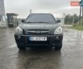 Черный Хендай Туксон, объемом двигателя 1.98 л и пробегом 173 тыс. км за 8800 $, фото 5 на Automoto.ua