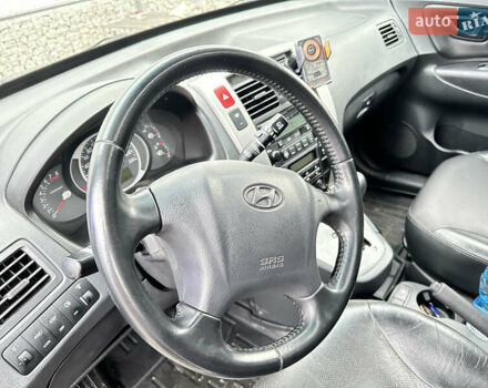 Чорний Хендай Туксон, об'ємом двигуна 2.66 л та пробігом 395 тис. км за 9950 $, фото 24 на Automoto.ua