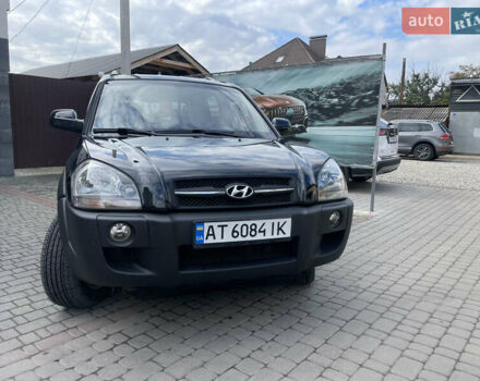 Черный Хендай Туксон, объемом двигателя 1.98 л и пробегом 177 тыс. км за 7600 $, фото 2 на Automoto.ua