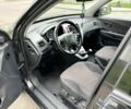 Черный Хендай Туксон, объемом двигателя 2 л и пробегом 233 тыс. км за 7500 $, фото 8 на Automoto.ua