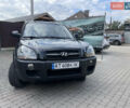 Черный Хендай Туксон, объемом двигателя 1.98 л и пробегом 177 тыс. км за 7600 $, фото 2 на Automoto.ua