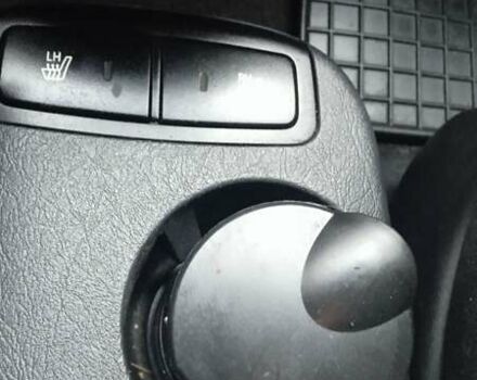 Черный Хендай Туксон, объемом двигателя 1.98 л и пробегом 200 тыс. км за 6600 $, фото 6 на Automoto.ua