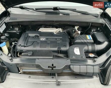 Чорний Хендай Туксон, об'ємом двигуна 2 л та пробігом 225 тис. км за 8000 $, фото 57 на Automoto.ua