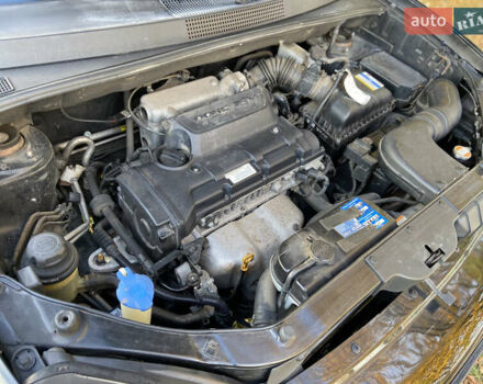 Хендай Туксон 2008 у Рівному на Automoto.ua Чорний Хендай Туксон, об'ємом двигуна 2 л та пробігом 165 тис. км за 7800 $, фото 7 на Automoto.ua