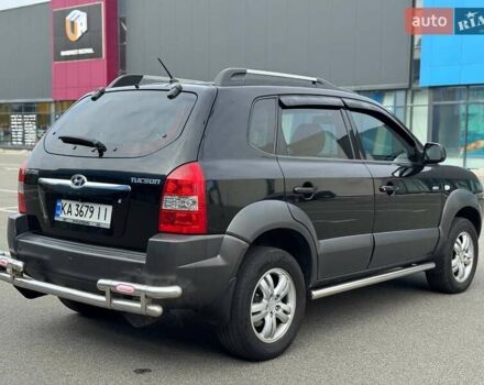 Черный Хендай Туксон, объемом двигателя 1.98 л и пробегом 202 тыс. км за 8350 $, фото 9 на Automoto.ua