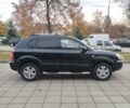 Черный Хендай Туксон, объемом двигателя 1.98 л и пробегом 214 тыс. км за 7700 $, фото 7 на Automoto.ua