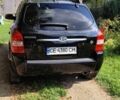 Черный Хендай Туксон, объемом двигателя 2 л и пробегом 224 тыс. км за 8000 $, фото 2 на Automoto.ua