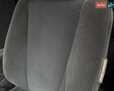 Черный Хендай Туксон, объемом двигателя 1.99 л и пробегом 240 тыс. км за 7200 $, фото 50 на Automoto.ua