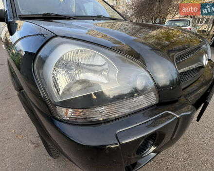 Черный Хендай Туксон, объемом двигателя 1.98 л и пробегом 196 тыс. км за 7999 $, фото 11 на Automoto.ua