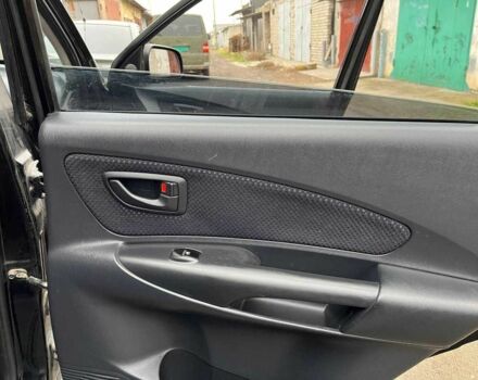 Черный Хендай Туксон, объемом двигателя 2 л и пробегом 270 тыс. км за 7600 $, фото 8 на Automoto.ua